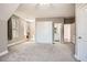 Bonus room with neutral colors, large windows, and a Murphy bed ready for overnight guests at 2987 Jefferson St, Atlanta, GA 30341