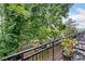Relaxing balcony with lush greenery, offering a private outdoor space and natural views at 319 Atlanta Se St # 315, Marietta, GA 30060