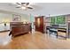 Bedroom with wood floors, ceiling fan, and lofted windows at 319 Atlanta Se St # 315, Marietta, GA 30060