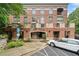 Exterior view of a brick apartment building showing the ground level entrance at 319 Atlanta Se St # 315, Marietta, GA 30060