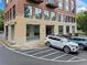 A ground level view of a brick building entrance with parking at 319 Atlanta Se St # 315, Marietta, GA 30060