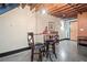 Cozy dining area with bar-height seating and exposed ceiling beams at 319 Atlanta Se St # 315, Marietta, GA 30060