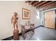 Welcoming entryway with unique decor and industrial-style exposed ceiling beams at 319 Atlanta Se St # 315, Marietta, GA 30060