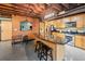Modern kitchen with granite countertops, stainless appliances, and exposed industrial ceiling at 319 Atlanta Se St # 315, Marietta, GA 30060