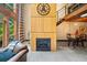Elegant living room featuring a modern fireplace, high ceilings, and exposed beams at 319 Atlanta Se St # 315, Marietta, GA 30060