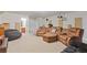 Finished basement with comfortable seating and home theater equipment at 3750 Sweeting St, Cumming, GA 30041