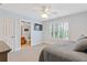 Bedroom featuring window shutters and attached bathroom at 3750 Sweeting St, Cumming, GA 30041