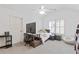 Bright bedroom with vaulted ceiling, sleek ceiling fan, and space saving desk at 3750 Sweeting St, Cumming, GA 30041