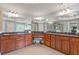 Expansive main bathroom with double vanity, granite countertops, and tiled floors at 3750 Sweeting St, Cumming, GA 30041
