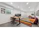 Spacious finished basement ideal for an office or den area, complete with multiple computer desks and large windows at 500 Read Ln, Atlanta, GA 30328