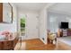 Welcoming entryway with hardwood floors, a console table, and natural light at 500 Read Ln, Atlanta, GA 30328
