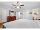 Spacious main bedroom with neutral walls, ensuite bathroom, walk in closet, and hardwood floors at 500 Read Ln, Atlanta, GA 30328