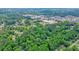 Lush greenery surrounds the neighborhood; an inviting community ideal for tranquil living and close to nearby schools at 588 Benson Hurst Sw Dr, Mableton, GA 30126