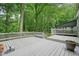 Spacious back deck, perfect for entertaining and enjoying the wooded scenery at 588 Benson Hurst Sw Dr, Mableton, GA 30126