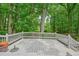 Large back deck space with white railings, offering plenty of room for outdoor enjoyment at 588 Benson Hurst Sw Dr, Mableton, GA 30126