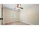 Empty room with a ceiling fan, and a sunny window at 588 Benson Hurst Sw Dr, Mableton, GA 30126