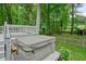 Covered hot tub located on back deck for relaxing after a long day at 588 Benson Hurst Sw Dr, Mableton, GA 30126