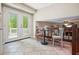 A cozy landing with space for dining, leads to a deck and overlooks the living room at 588 Benson Hurst Sw Dr, Mableton, GA 30126