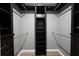 Spacious walk-in closet with ample storage and organization at 588 Benson Hurst Sw Dr, Mableton, GA 30126