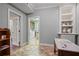 Hallway leads to a laundry room with additional features at 2630 Weddington Ne Pl, Marietta, GA 30068