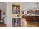 Stylish kitchen includes a wine fridge, custom cabinetry, and seamless access to the adjacent dining area at 2630 Weddington Ne Pl, Marietta, GA 30068