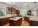 Spacious kitchen showcasing granite countertops, custom cabinetry, and stainless steel appliances at 2630 Weddington Ne Pl, Marietta, GA 30068