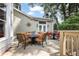 Inviting outdoor deck with multiple seating areas perfect for entertaining or relaxing at 2630 Weddington Ne Pl, Marietta, GA 30068