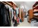 Large walk-in closet with organized shelving and hanging racks providing ample space for clothes and accessories at 2630 Weddington Ne Pl, Marietta, GA 30068