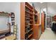 Spacious walk-in closet featuring custom shelving, shoe racks, and ample storage for clothing and accessories at 2630 Weddington Ne Pl, Marietta, GA 30068