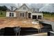 Charming two-story home with stone accents, dormer windows, and an attached two-car garage at 313 Willow Cv, Canton, GA 30114