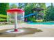 Community water park featuring a mushroom water feature and a fun slide area at 313 Willow Cv, Canton, GA 30114