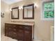 Bathroom with double vanity, granite countertop, and tiled floors at 4507 Reva Way, Marietta, GA 30066