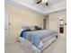 Spacious bedroom with ensuite bathroom, carpet, and tray ceiling at 4507 Reva Way, Marietta, GA 30066