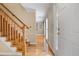 Welcoming entryway showcasing hardwood floors and a classic staircase at 4507 Reva Way, Marietta, GA 30066