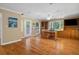 Well-lit office featuring hardwood flooring and custom built-in shelving at 4507 Reva Way, Marietta, GA 30066