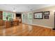Large office space with hardwood floors, custom cabinets, built-ins, and multiple windows for natural light at 4507 Reva Way, Marietta, GA 30066
