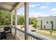 Inviting balcony offers outdoor seating and a peaceful view of the surrounding landscape at 507 Bishop Ln, Woodstock, GA 30188