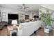 Open living room with hardwood floors, bright natural light, and contemporary furnishings at 507 Bishop Ln, Woodstock, GA 30188