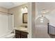 Bathroom and bonus room combination with bathtub and granite countertops at 59 Grand Georgian Ne Ct, Cartersville, GA 30121