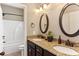 Bathroom featuring granite countertops, double sinks, and a bathtub at 59 Grand Georgian Ne Ct, Cartersville, GA 30121