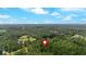 Overhead shot of a wooded lot with a marker, revealing a private oasis perfect for building your dream home at 712 Honeysuckle Ln, Temple, GA 30179