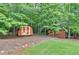 Storage sheds in a backyard setting, ideal for storing your tools and equipment at 712 Honeysuckle Ln, Temple, GA 30179