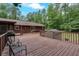 Spacious wooden deck with seating, perfect for enjoying the outdoors at 712 Honeysuckle Ln, Temple, GA 30179