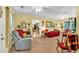 Sunlit living room showcases a traditional design with comfortable seating at 712 Honeysuckle Ln, Temple, GA 30179