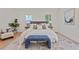 Spacious bedroom with natural light, neutral decor, and a comfortable seating area at 1363 Diamond Se Ave, Atlanta, GA 30316