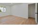 Bright, empty bedroom with natural light, hardwood flooring, and closet at 1363 Diamond Se Ave, Atlanta, GA 30316