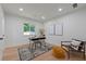 Bright home office with light hardwood flooring, a modern rug, and recessed lighting at 1363 Diamond Se Ave, Atlanta, GA 30316