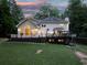 Backyard with large deck, soccer net, and lush landscaping at 4673 Jefferson Township Pl, Marietta, GA 30066