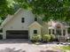 Well-maintained home with a two-car garage and charming curb appeal at 4673 Jefferson Township Pl, Marietta, GA 30066