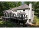 Spacious home featuring an expansive deck, perfect for outdoor entertaining at 4673 Jefferson Township Pl, Marietta, GA 30066